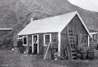 The first Ferry accommodation house, little more than a two-roomed clay whare built by Arthur Munsen who was also the ferryman [186-]