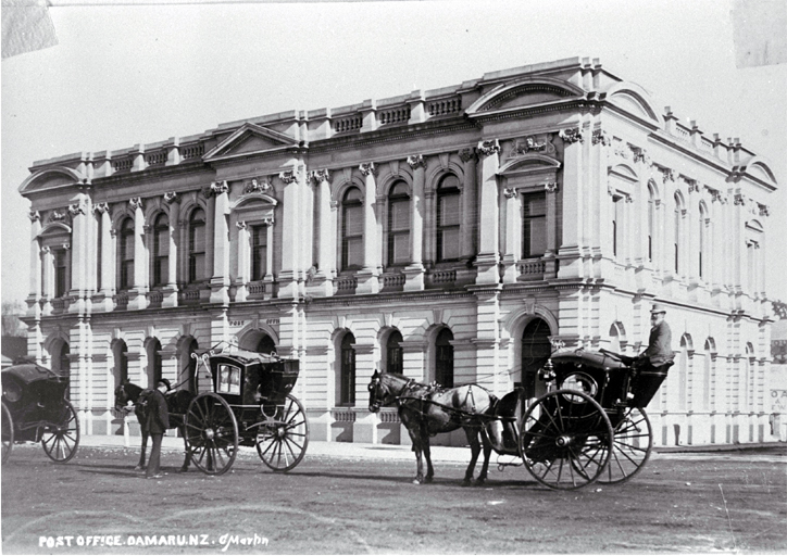 Hansom cabs stand outside the Post Office, Oamaru 