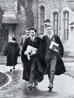 Photograph of Undergraduate students in gowns in the quadrangle on their way to lecture rooms, Canterbury College [1926?]