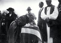 Lady Jellicoe places her signature in "The History of the Canterbury Regiment 1914-1919", foundation stone ceremony, Bridge of Remembrance