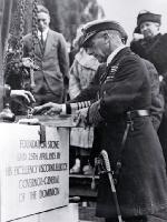 Lord Jellicoe completes the levelling of the foundation stone of the Bridge of Remembrance