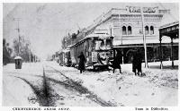 A tram runs into difficulties, at the corner of Colombo and Armagh Streets, when Christchurch was hit by snow [1918?]