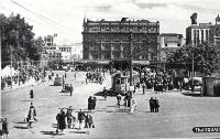 Pedestrians and a tram in Cathedral Square Christchurch, ca 1940