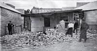 Some of the destruction by earthquake at Cheviot, North Canterbury, 16 Nov. 1901 : back of McTaggart's butcher/baker shop. [17 Nov. 1901]
