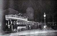 The Christchurch Tramway Company's opening of the Papanui line : the trial trip on midnight of Friday June 2nd : a photograph taken with a flash in Cathedral Square. [2 June 1905]