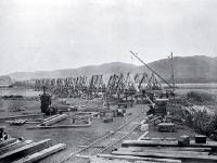 The south end of the combined road and rail bridge under construction over the Waiau River [1910]