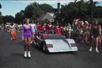 Car float and rollerskaters