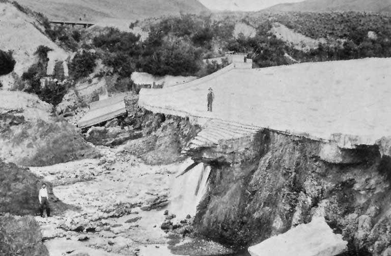 The downward side of the Kowai Dam. The flume on the new race is seen in the distance.