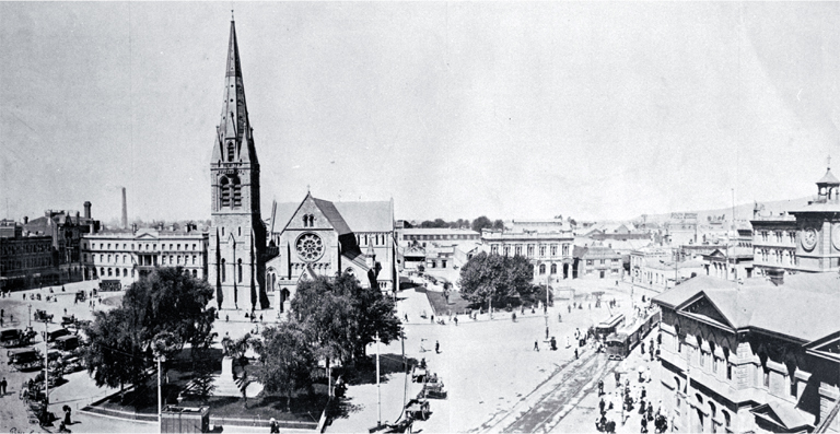 Cathedral Square from the top of the Royal Exchange building showing trams, Post Office and Cathedral, cabs 