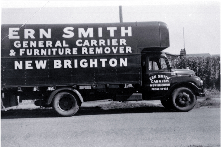 A truck belonging to Ern Smith, general carrier and furniture remover, New Brighton 