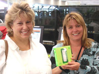 Keeping in touch winner Karen Atherton with her new iPod and Marketing Assistant Vicky Heward