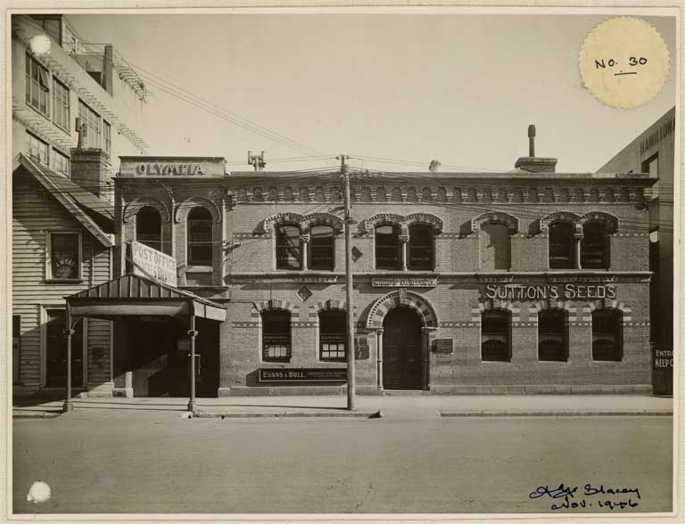 Image of No. 30. Photograph showing front elevation of whole of Hereford Street Properties - (portion of Gee's not showing). 1946