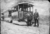 A Kitson steam tram hauling two saloon double-deckers