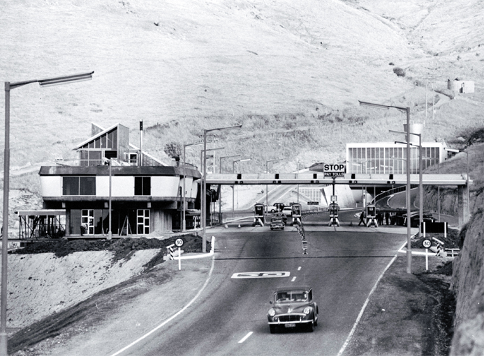 Administration building and portal on the Heathcote side of the Christchurch-Lyttelton Road Tunnel. Note toll booths. 
