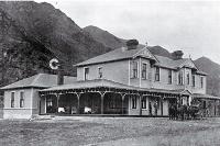 The newly completed Ferry Hotel, Waiau, with the Hanmer coach in front [ca. 1905]