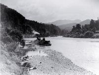 A gold dredge on the Buller River, West Coast [picture