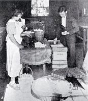 Poultry raising and egg production in Canterbury : stamping, weighing and packing eggs at Fazackerley's poultry farm, Sockburn, Christchurch.