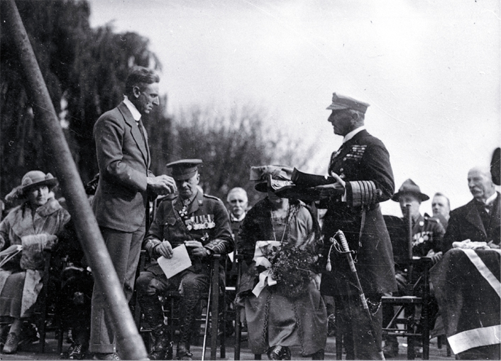 Mr Gummer, architect, presenting Lord Jellicoe with trowel and mallet, foundation stone ceremony, Bridge of Remembrance 