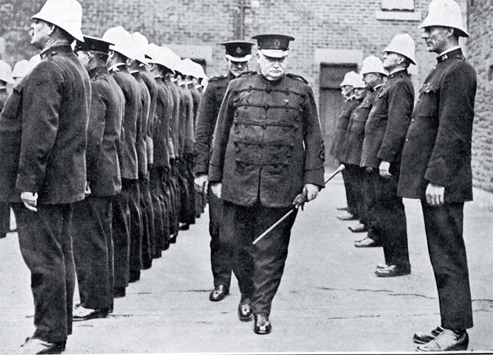 Superintendent W H Mackinnon makes his last inspection of his men, as the Christchurch police force bid him farewell 