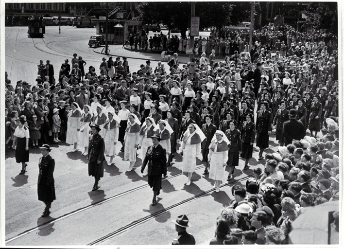 Representatives of the women's services march in the One Hundred Years of Progress parade 