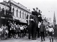 A Christmas parade passes along Colombo Street, Christchurch 