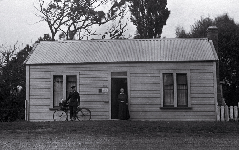 Amelia Frances Rogers (1849-1928) pictured with a postman, Mr Heffenden, outside 348 New Brighton Road which was also the Burwood Post Office until 1928 