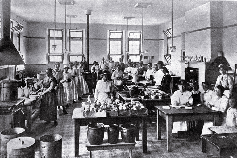 The soup kitchen at the Sydenham Manual Training Centre : some workers under Miss Ponder.
