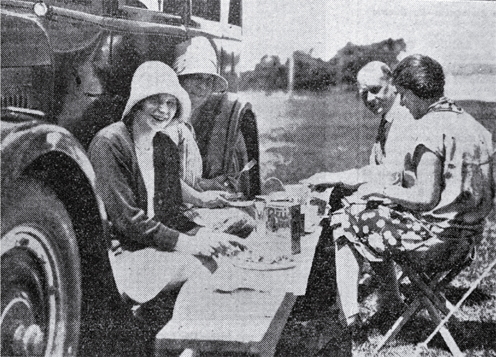 A family picnic on a summer's day at Addington Show Grounds' motorist's camping ground, Christchurch 