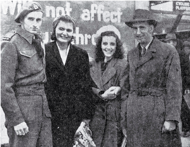 New Zealand servicemen and their war brides shown shortly after their arrival on the Rangitata, photographed at the Christchurch railway station 