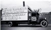 A truck belonging to Canterbury Transport Ltd, furniture removers and general carriers, 87 St Asaph Street, Christchurch 