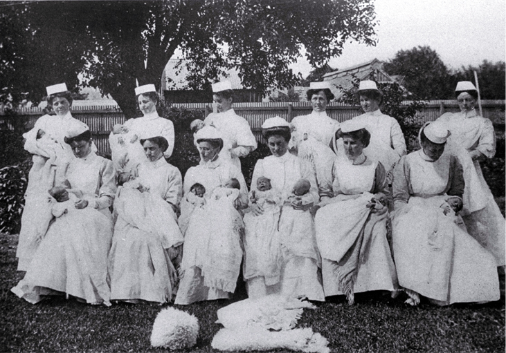 A group of St. Helen's nurses with their charges 