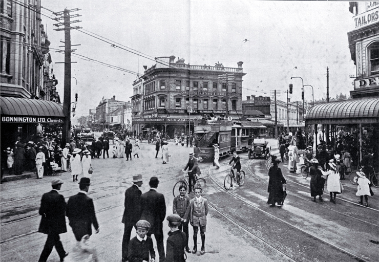 A busy spot in Christchurch, at the junction of High and Cashel Streets : in the centre is the Hallensteins Building.