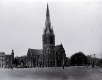 The Cathedral and Square, Christchurch : to the left is The Press building & Government Building, & at right is the Bank of New Zealand.