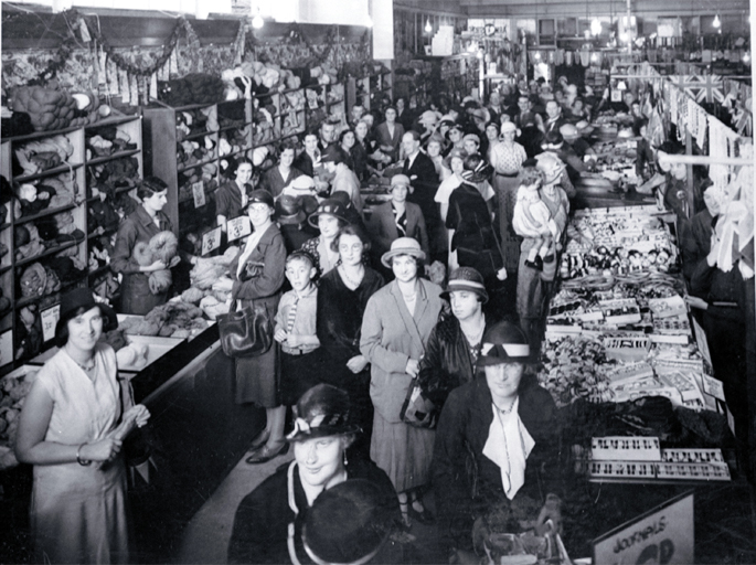 Interior view, shoppers in T. Armstrong & Co. store Interior view, shoppers in T. Armstrong & Co. store