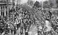 The march of the 16th Infantry, reinforcements for ANZACs, through Christchurch streets 