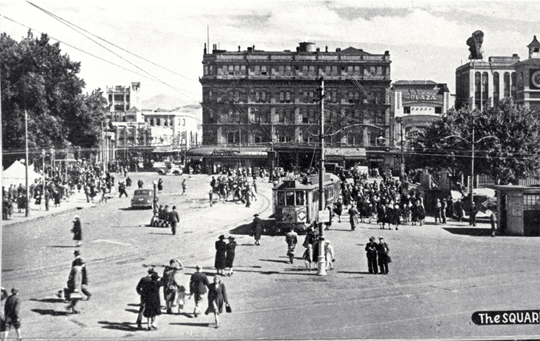 Pedestrians and a tram in Cathedral Square, Christchurch 