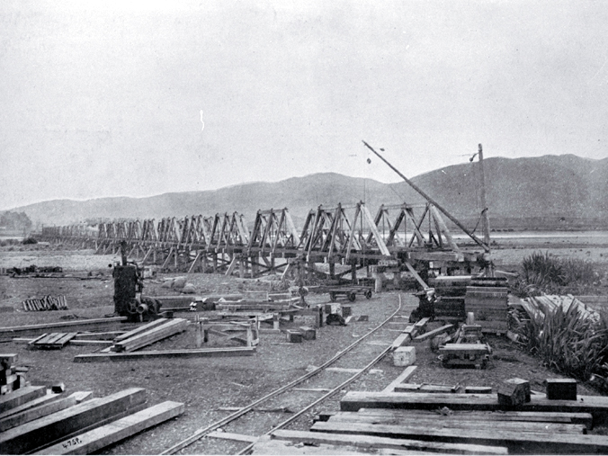 The south end of the combined road and rail bridge under construction over the Waiau River The south end of the combined road and rail bridge under construction over the Waiau River