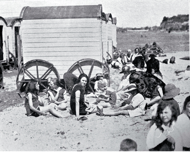 Bathing machines and sun bathers at Caroline Bay, Timaru 