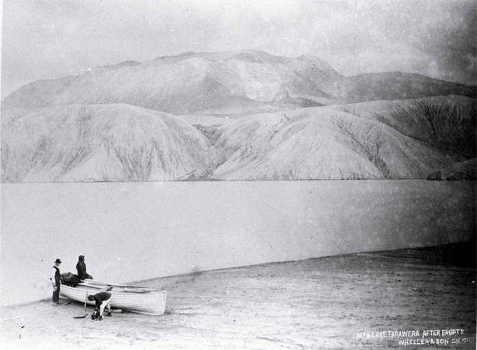 The photographic team of W. E. Sorrell (Wheeler & Son) by Lake Rotomahana after the eruption on the site of Te Ariki 