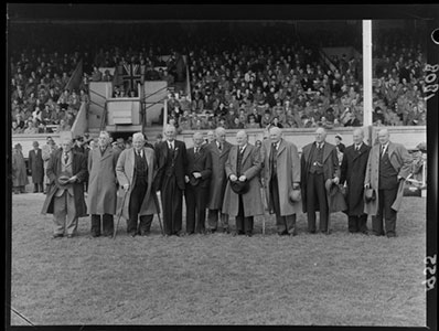 Members of the 1905 All Black rugby union football team gather at Athletic Park, Wellington, 1955.