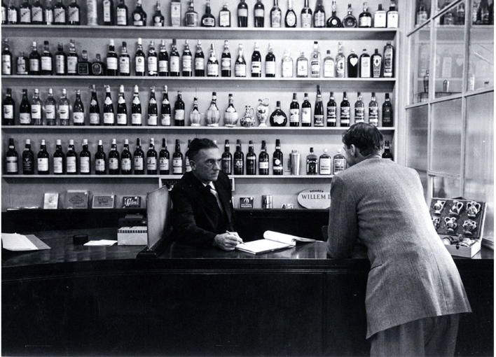 Serving a customer at Maling & Co. Ltd, 86 Gloucester Street 