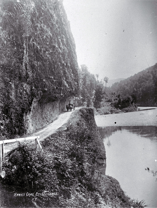 Horses and buggy under Hawk's Crag on the Buller Gorge road, West Coast 