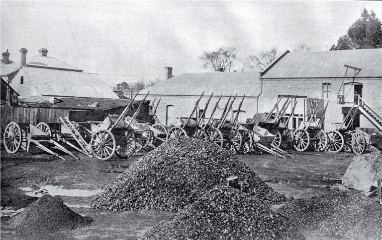 Inside the corporation yard : showing some of the materials and equipment used by the Municipal Electricity Department, Christchurch.