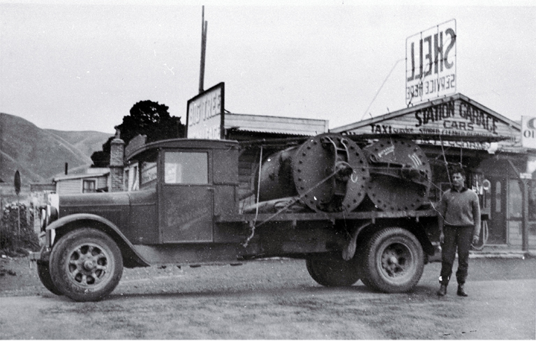1929 Dodge owned by W. Capper and son with two digesters en route to the Levin Abbatoir 