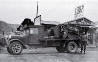 1929 Dodge owned by W. Capper and son with two digesters en route to the Levin Abbatoir 