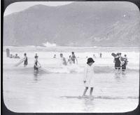 Swimmers in the surf, possibly at a Wellington beach