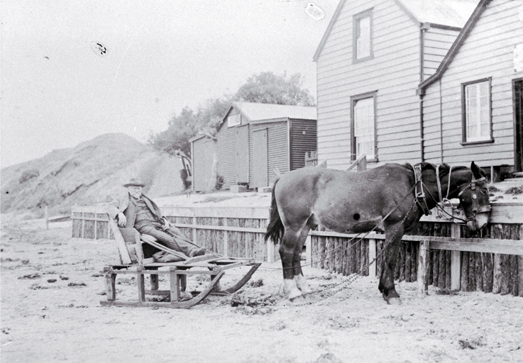 A crippled Alexander Shand on a sled at Waitangi shortly before his death in 1910 