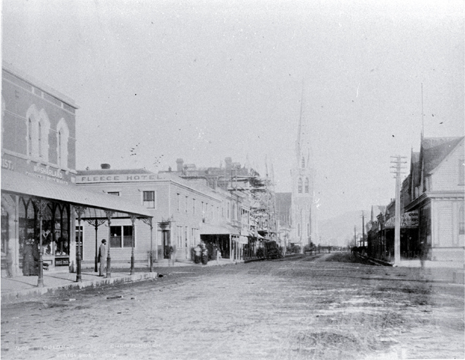 Colombo Street north : on left is Mrs Sharland's corset shop, on corner of Armagh Street is Golden Fleece Hotel. Colombo Street north : on left is Mrs Sharland's corset shop, on corner of Armagh Street is Golden Fleece Hotel.