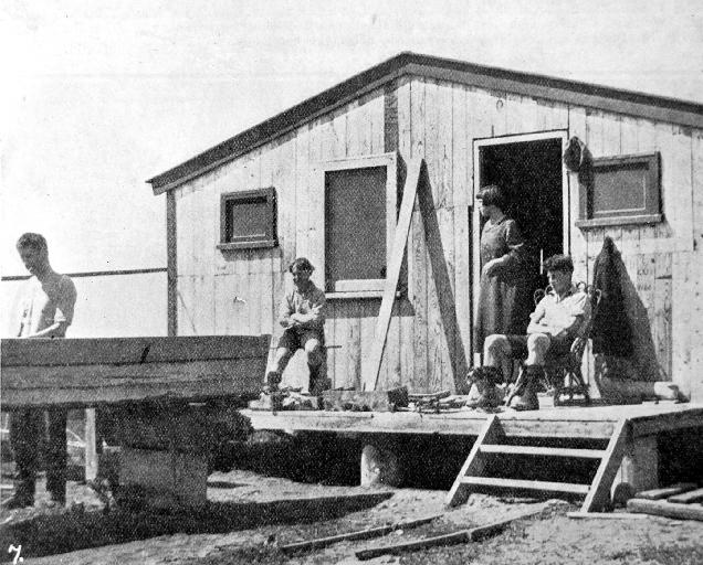 Boat builders at work on a punt.