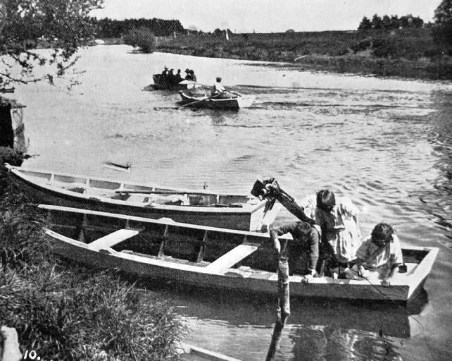 The youngsters make their own enjoyment with the help of some boats and their vivid imaginations.